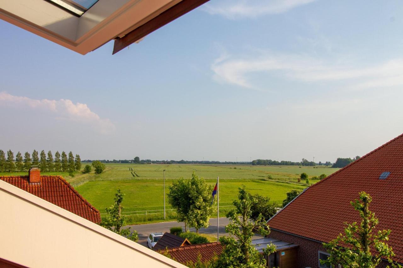 Apartamento Up Besöök - Rapsblüte Krummhörn Exterior foto